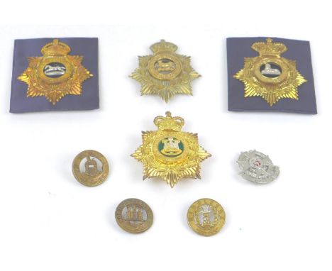 Four British Army Helmet plates and four helmet centres, comprising Hampshire, Devonshire and Dorset, Lincolnshire and West Y