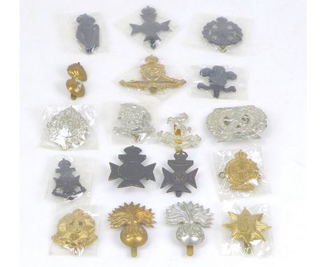 A collection of eighteen British army regiment badges, predominantly London regiments including Artists Rifles, Finsbury Rifl