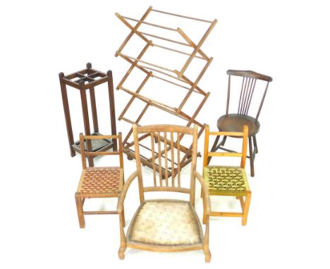 A group of vintage furniture, comprising an open armchair on very short legs, two child's chairs, an oak stick stand, 31 by 2