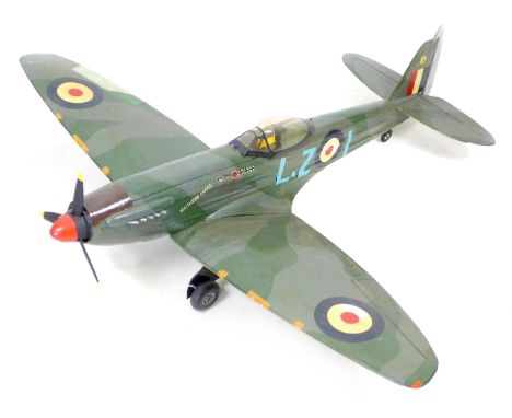 A large scale model of a WWII British Spitfire, with pilot, markings, 112 by 100 by 35cm high. 