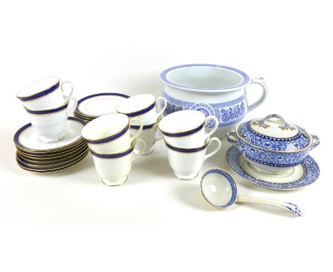 A Royal Worcester part tea service in the Howard pattern, comprising eight cups, 8cm high, saucers, 15cm diameter and tea pla