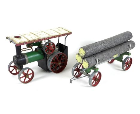 A Mamod TE1A Steam Tractor, 27 by 12.5 by 17.5cm high, with log trailer, 28 by 11 by 13cm high, together with three grey poly