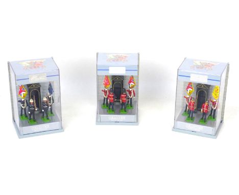 Three Britains die-cast model British Army colour parties, comprising The Scots Guards, The Middlesex regiment, and The Royal