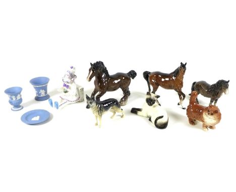 A collection of five Beswick animal figurines, comprising Shire Horse number 975, 21cm high, bay Thoroughbred, 22cm high, She