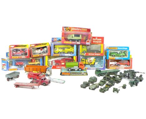 A collection of Dinky Toys and Matchbox die-cast toy model vehicles, including  Dinky Toys  Refuse Wagon 978, E.R.F. Fire Ten