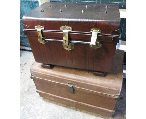 Small vintage tin trunk with brass mounts and locks together with another larger two handled vintage trunk. 