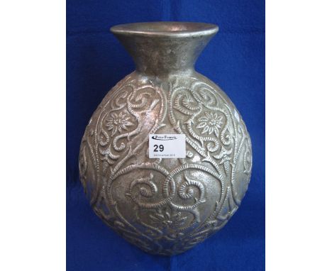 Isnik design ceramic baluster shaped vase with relief decoration.