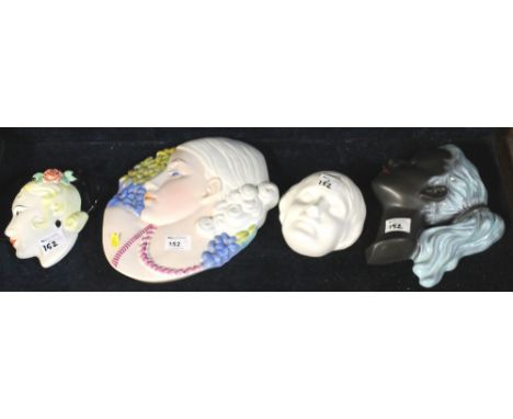 Four ceramic wall plaques depicting female heads, to include Staffordshire etc. (4)