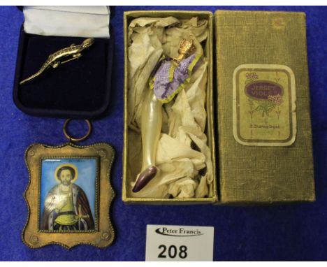 Scent bottle in the form of female leg with crown stopper in Jersey violet box, together with orthodox Christian enamel devot