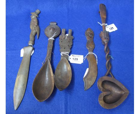 Collection of five items of treen, to include two probably Scandinavian chip carved celtic design decorative or love spoons, 