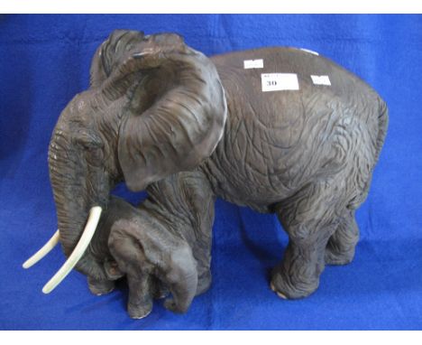 Large modern ceramic study of an African elephant with calf.