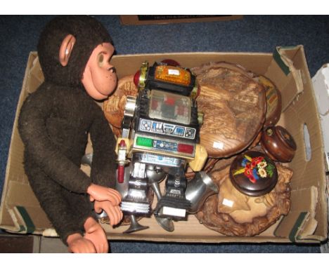 Tray of assorted items to include vintage plastic robot, soft toy monkey, carved wooden plaques, pewter goblets, treen boxes 
