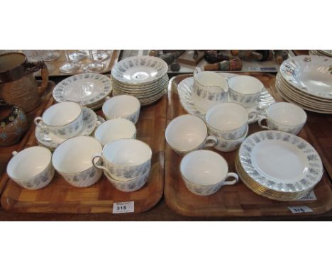 Two trays of Minton fine bone china 'Alpine Spring' teaware to include; teacups and saucers, milk jug, sucrier and side plate