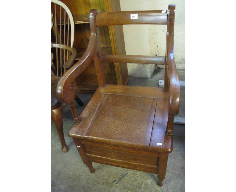 19th Century oak bar back commode carver chair. 
