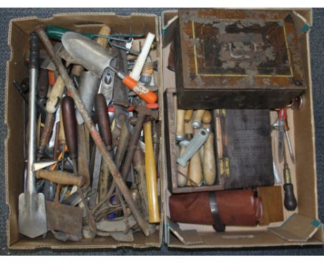 A box of mixed vintage tools.