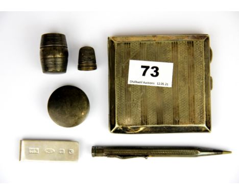 A hallmarked silver thimble case and thimble, with a silver patch box, sterling silver money clip and a silver plated cigaret