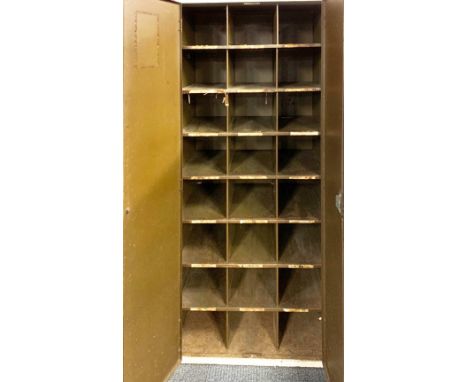 A vintage metal storage cabinet with pigeon hole interior, 71 x 168 x 46cm.