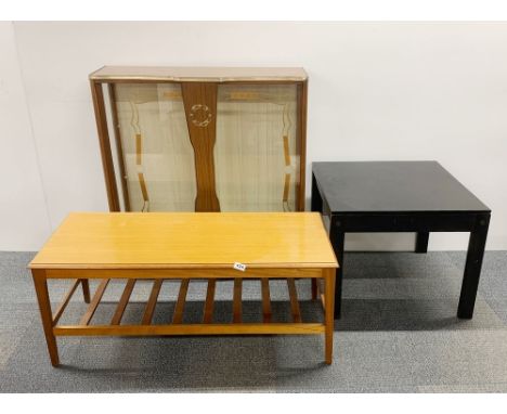 A 1960's teak coffee table, 106 x 45 x 43cm, together with a painted backgammon coffee table  and a 1960's glazed display cab