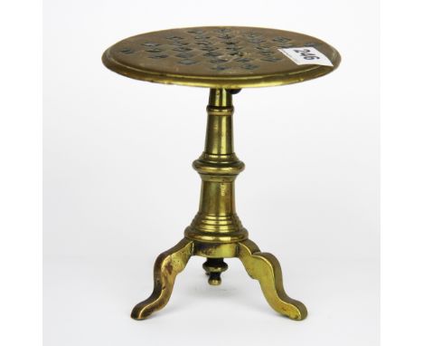 A Georgian miniature brass tilt top chess table, H. 15cm. D. 14cm.