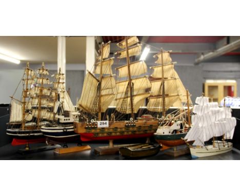 A group of wooden model boats, tallest 43cm.