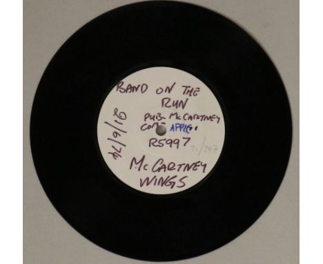 WINGS - BAND ON THE RUN WHITE LABEL TEST PRESSING - A 7" white label test press of Wings' Band on The Run. Handwritten labels