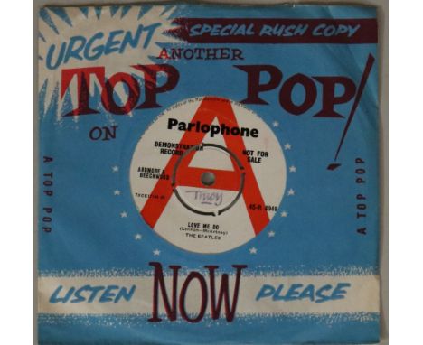 THE BEATLES - LOVE ME DO - UK 7" DEMO - The phrase 'holy grail' is brandished around a lot these days, but surely this is up 