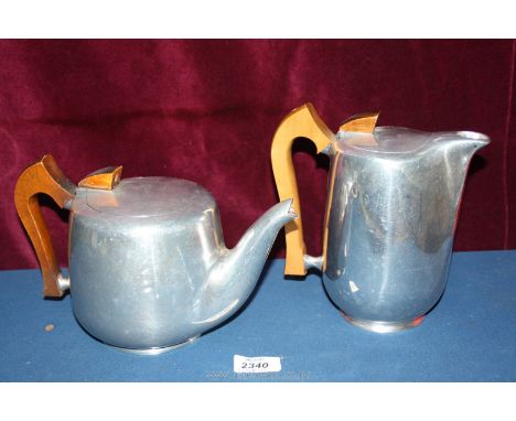 A Picquot ware teapot and hot water jug.