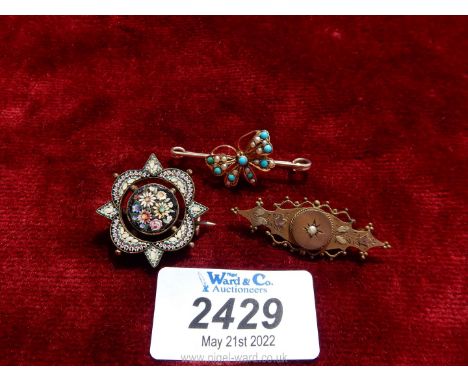 Three brooches including floral micro mosaic, turquoise and pearl butterfly and Victorian bar brooch set with pearls and flor