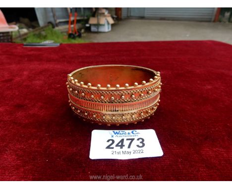 A gilded silver ladies bangle.