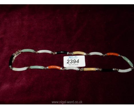 A multi Jade and 925 silver necklace;  15 pieces, solid tubes of jade, 45 cms.