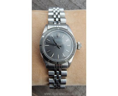 A circa 1973 Ladies Rolex Oyster Perpetual vintage stainless steel wristwatch, model 6723, serial number 3319532. The circula