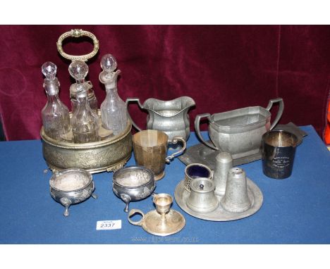 A quantity of cruet sets, pewter tray and jugs, EPNS cup and beaker, candlestick etc.