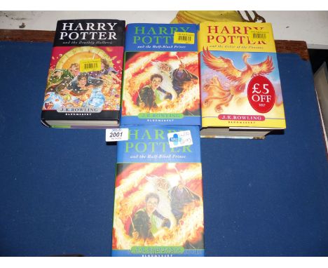 Four Harry Potter books; two volumes of The Half Blood Prince, The Deathly Hallows (all first editions) and The Order of The 