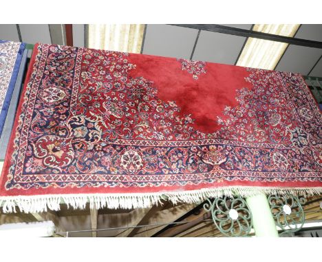 Large red ground Persian pattern Wilton style carpet/rug