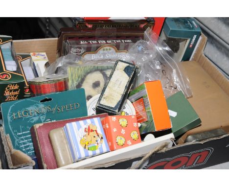 Selection of games, playing cards, Garfield and Astorix novelty cufflink's, die cast vehicles etc.
