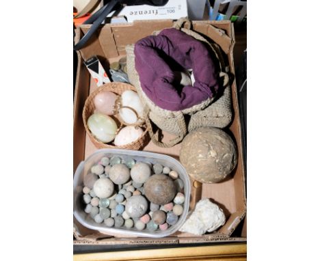 Selection of clay marbles, ceramic eggs, brass weights, old baseball, onyx eggs etc.