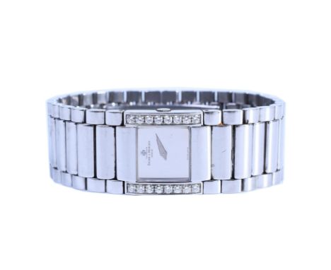 Baume & Mercier, stalen dames polshorloge, quartz. Model 'Catwalk'. Met spiegelende wijzerplaat, aan weerzijden bezet met bri