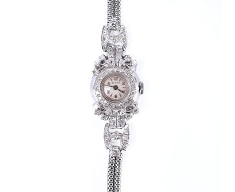 Orfina, platina mechanisch dames cocktail horloge, jaren '50 - '60. De kast en aanzetstukken rijkelijk bezet met achtkant ges