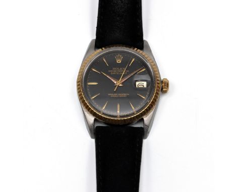 Rolex, stalen heren polshorloge, automaat. Model Datejust, ref. 1601. Met geelgouden lunette en zwarte wijzerplaat. Serienumm