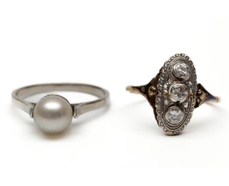 14 kt. Goud met platina fijne ring, Art Deco. De bovenzijde bezet met drie oud briljant geslepen diamanten met een gezamenlij