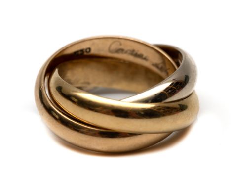 Cartier, 18 kt. gouden ring, model Trinity. Bestaande uit een geel,- wit,- en roségouden ring. Gesigneerd Cartier bruto 9,6 g