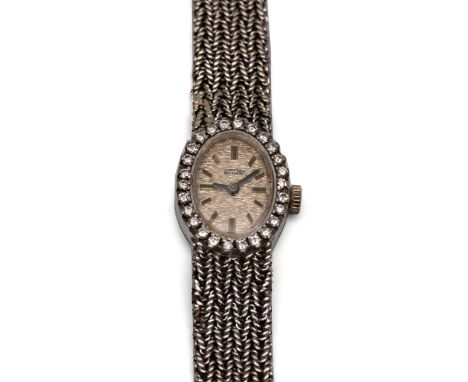 Mars Super, 14 kt. witgouden mechanisch damespolshorloge, jaren '60. Aan een grof geweven gouden schakel band, de lunette bez