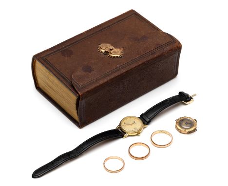 Twee 14 kt. gouden horloges, één Paladini, de ander zonder band. Hierbij een bijbel met gouden sluiting en drie 14 kt. gouden