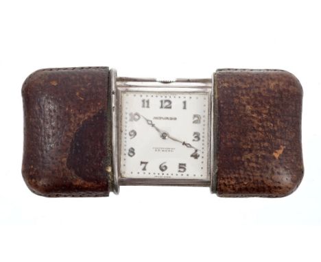 1920s Movado Chronometer Ermeto silver travel watch with patent mechanism, in leather covered silver case (London Import mark