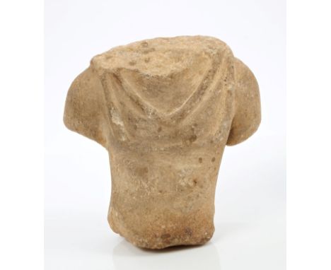 Ancient, probably Roman, carved stone torso of a male figure wearing a toga, 10cm highProvenance: Collection of Captain Georg