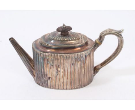 George IV Scottish silver teapot of oval reeded form, silver loop handle with leaf terminal and ivory insulators, straight ta