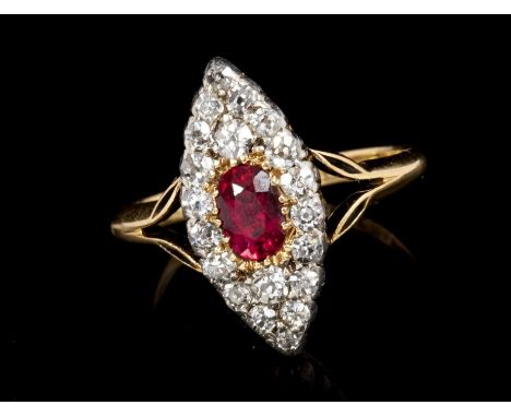 Late Victorian ruby and diamond marquise-shaped cluster ring, centred with a single mixed cut ruby surrounded by twenty old c