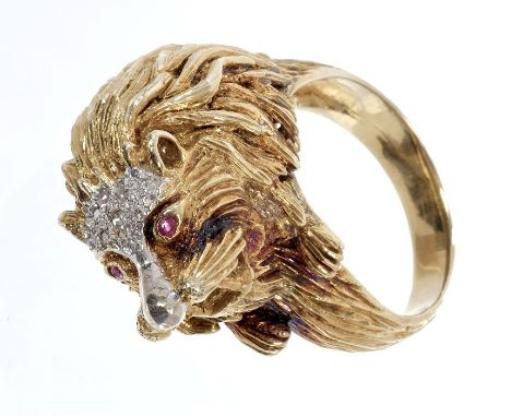 Unusual yellow metal ring in the form of a lion, with ruby eyes and diamond set mane, stamped - 585.  Ring size approximately