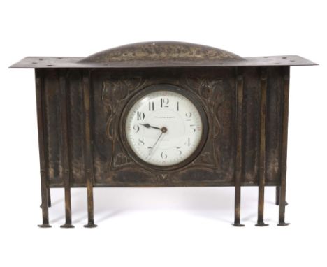 Late 19th / early 20th century Arts & Crafts mantel clock with French movement and lever escapement, white enamel dial with A