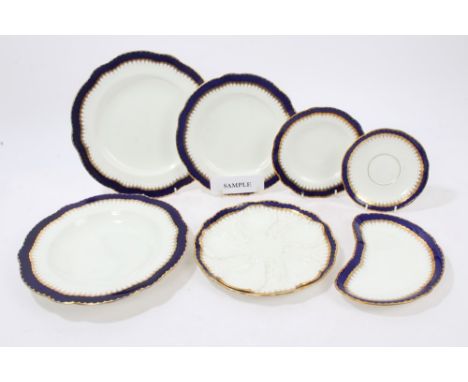 Late Victorian Coalport part dinner service, retailed by Maple & Co. Ltd. London, with gilt and blue edging - comprising thre